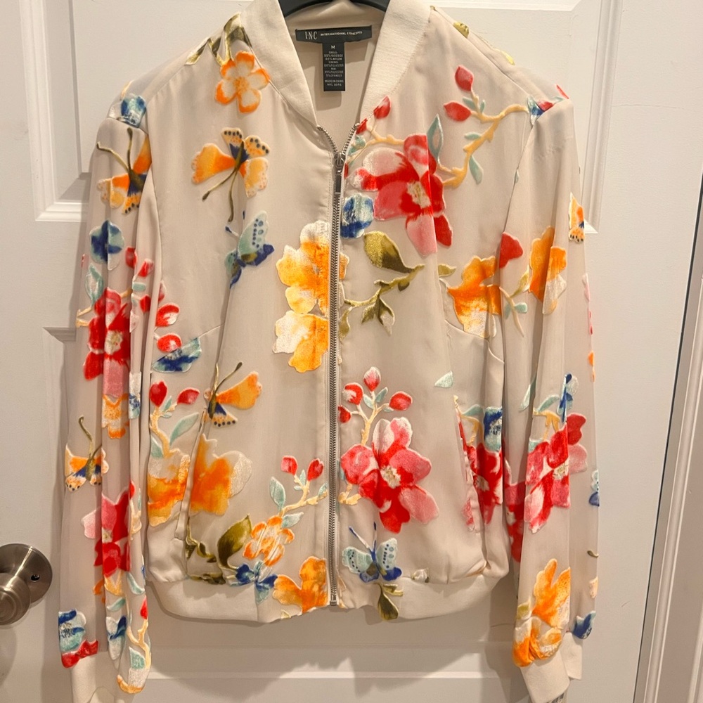 Beautiful floral short lightweight jacket. New with tags